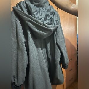 Woman’s dark grey coat with hood
